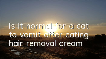 Is it normal for a cat to vomit after eating hair removal cream?